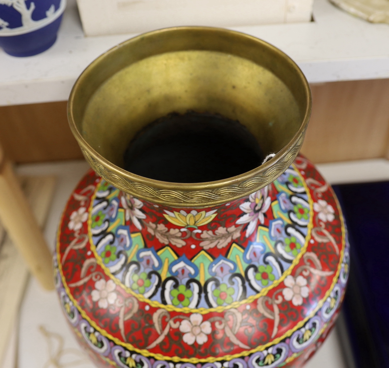 A large Chinese red ground cloisonné enamel vase, 51cm tall